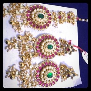 Takkar work earrings and headpiece